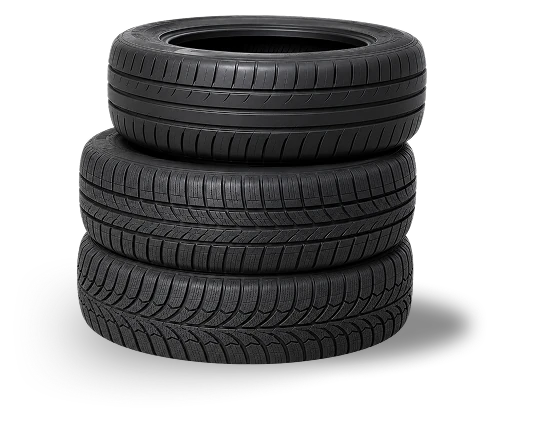Three stacked tires showing different tread patterns.