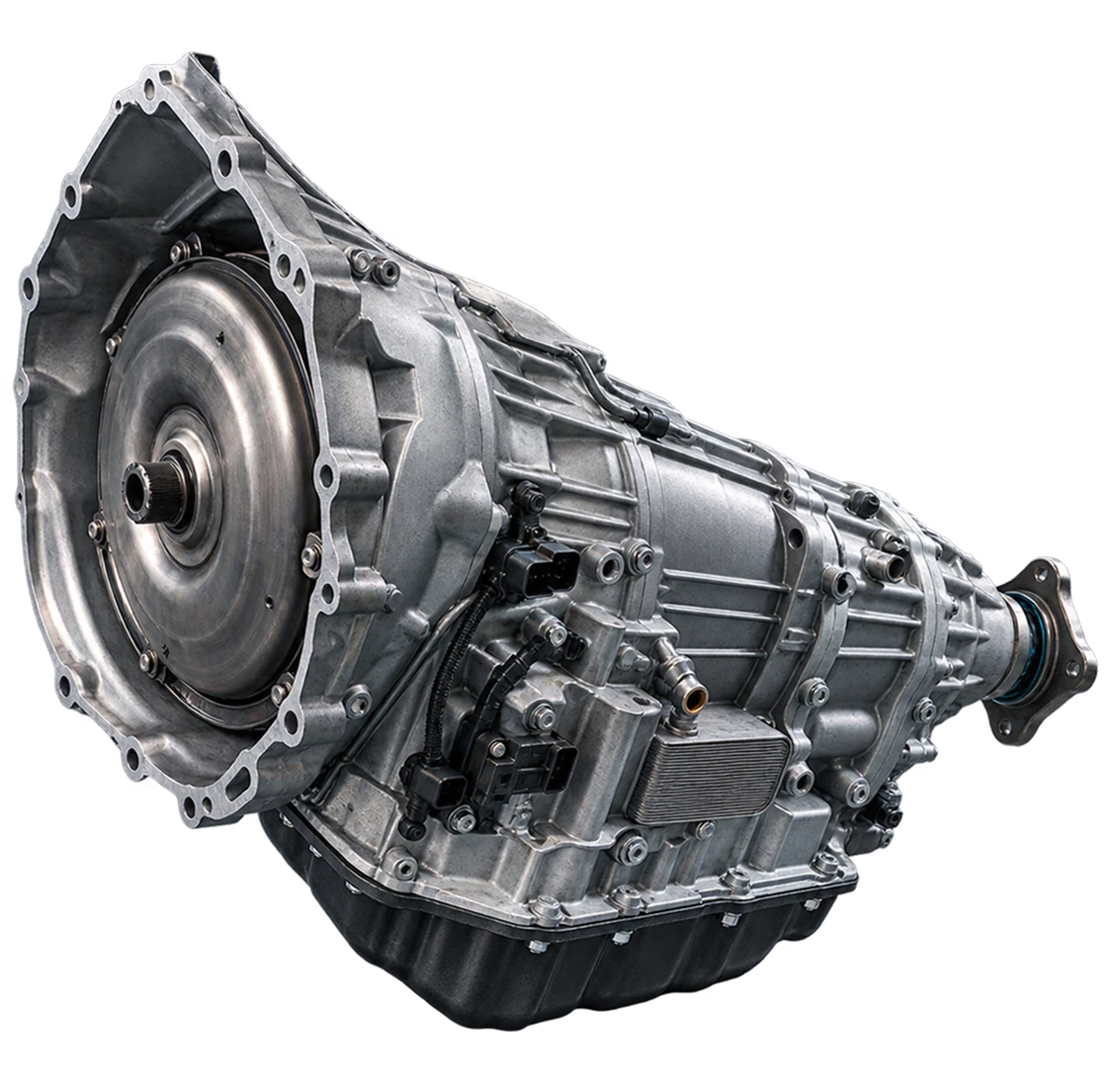 An automatic transmission unit, showing its torque converter housing, valve body and output shaft.
